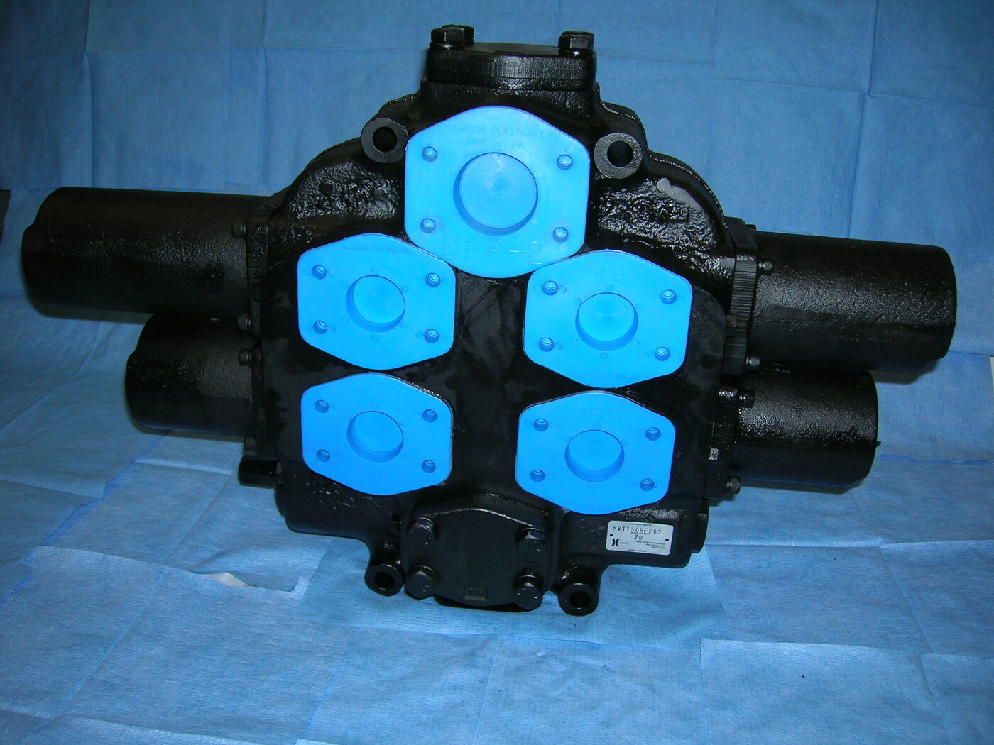 Large painted hydraulic valve assembly on shop floor at Reidville